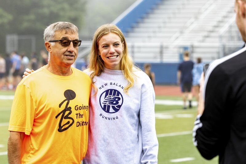 Olympian MacLean encourages campers to love running every day